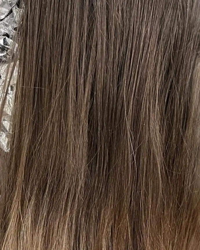 Before: grown-out brunette with faded ends