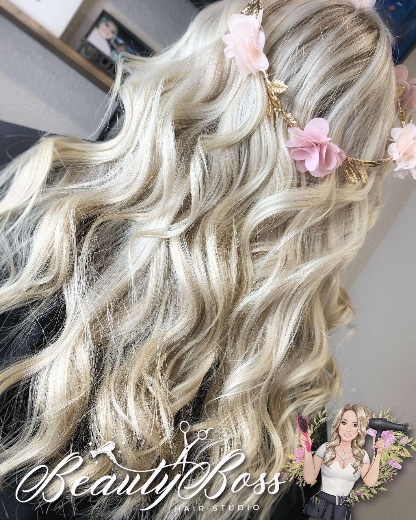 Long platinum blonde hair styled in loose waves with a pink flower crown