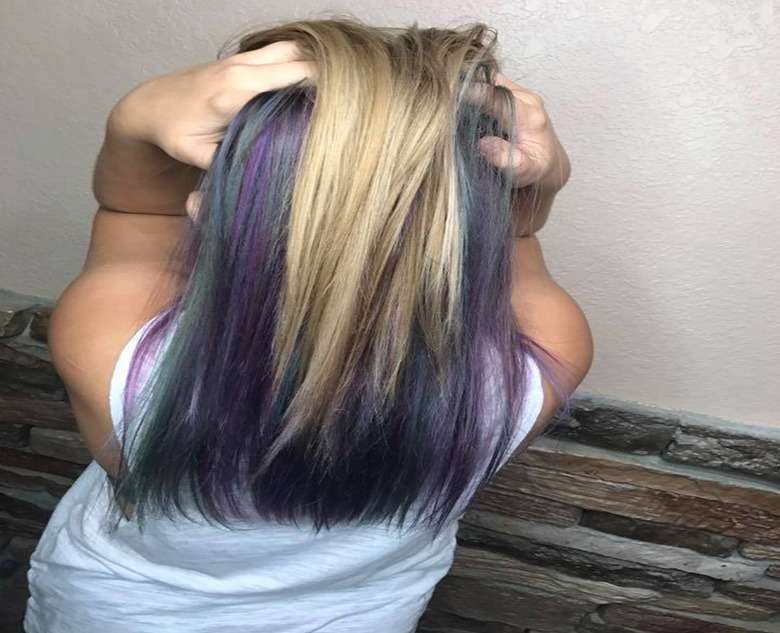 Blonde on top with a violet and teal underlayer